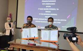 Gandeng Bank Mandiri, PT Pos Indonesia Perluas Layanan Keuangan dan Kurir