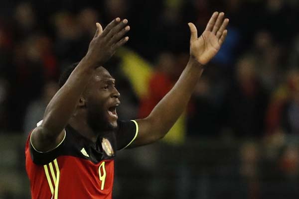 Striker Belgia Romelu Lukaku setelah mencetak gol balasan ke gawang Yunani di pengujung laga Pra-Piala Dunia 2018. - Reuters/Yves Herman