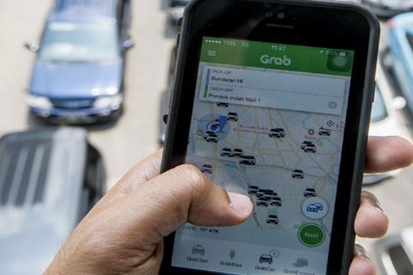 Aplikasi taksi daring, Grab - Antara