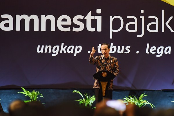 Presiden Joko Widodo memberikan arahan saat sosialisasi terakhir tax amnesty di Jakarta, Selasa (28/2). - Antara/Akbar Nugroho Gumay