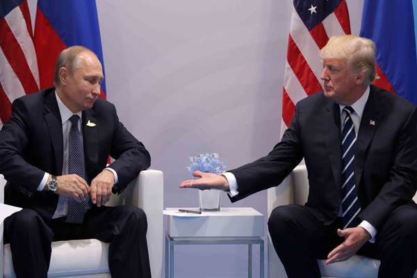 Presiden Rusia Vladimir Putin dan Presiden AS Donald Trump di KTT G20, Hamburg Jerman. - Istimewa