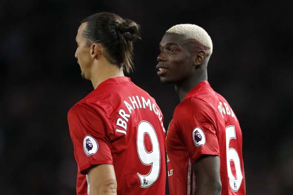 Dua andalan Manchester United, Zlatan Ibrahimovic (kiri) dan Paul Pogba - Reuters/Darren Staples