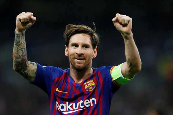 Ujung tombak FC Barcelona Lionel Messi digaji 50 pound sterling per tahun. - Reuters/Eddie Keogh