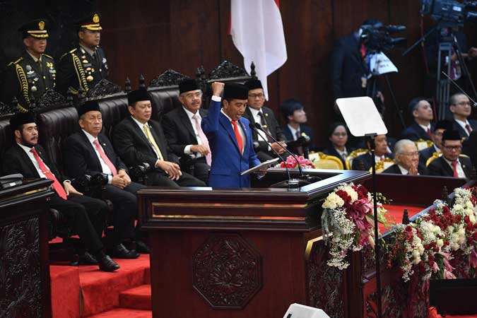 Presiden Joko Widodo menyampaikan pidato dalam Sidang Tahunan MPR di Kompleks Parlemen, Senayan, Jakarta, Jumat (16/8/2019). - ANTARA FOTO/Sigid Kurniawan
