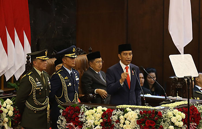 Presiden Joko Widodo berpidato seusai dilantik menjadi Presiden RI periode 2019-2024 di Gedung Nusantara, kompleks Parlemen, Senayan, Jakarta, Minggu (20/10/2019). Bisnis - Nurul Hidayat