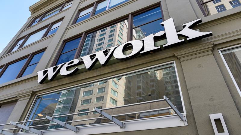  Logo WeWork terlihat di luar kantornya di San Francisco, California, AS 30 September 2019.  - Reuters
