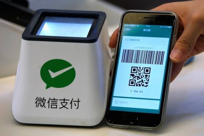 Sistem WeChat Pay ditunjukkan di kantin sebagai bagian dari kantor Tencent di dalam Zona Industri Kreativitas TIT di Guangzhou, China 9 Mei 2017. -  REUTERS / Bobby Yip 