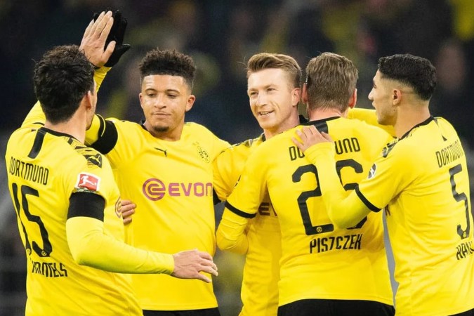 Pemain Borussia Dortmund merayakan gol - Bundesliga.com.