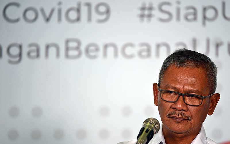 Juru Bicara Pemerintah untuk Penanganan COVID-19 Achmad Yurianto memberikan keterangan pers di Graha BNPB, Jakarta, Kamis (19/3/2020). ANTARA FOTO - Aditya Pradana Putra