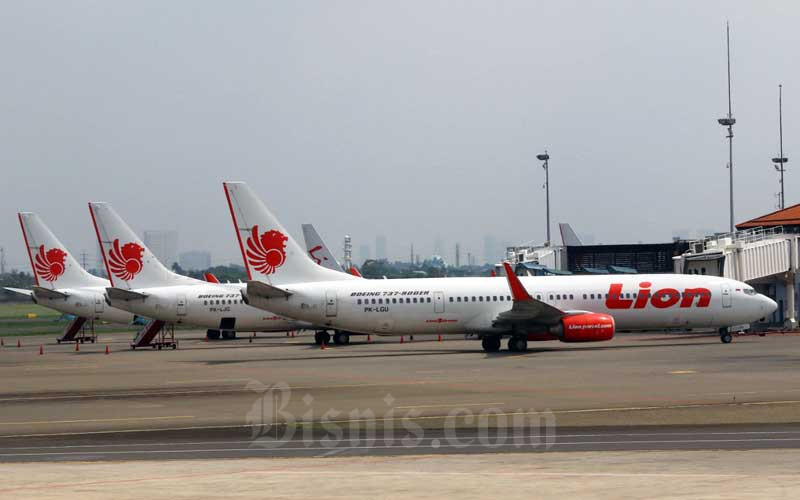 Pesawat Lion Air terparkir di Apron Bandara Soekarno-Hatta, Tangerang, Banten, Selasa (17/3/2020). Bisnis - Eusebio Chrysnamurti