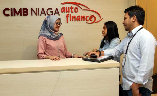 Karyawan beraktivitas di kantor CIMB Niaga Auto Finance di Jakarta. Bisnis - Endang Muchtar