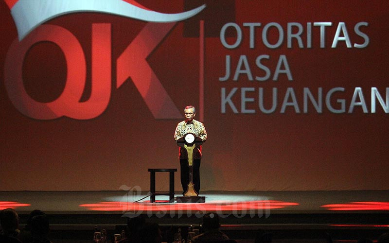 Ketua Otoritas Jasa Keuangan (OJK) Wimboh Santoso memberikan kata sambutan pada Pertemuan Tahunan Industri Jasa Keuangan 2019 dan Arahan Presiden RI di Jakarta, Jumat (11/1/2019). Bisnis - Nurul Hidayat