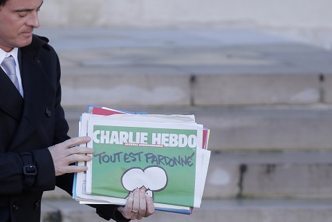 Ilustrasi-Majalah Charlie Hebdo yang terbit setelah tragedi penembakan di kantor redaksi majalah satir tersebut - Reuters