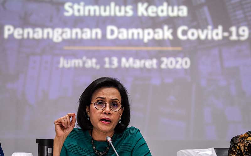 Menteri Keuangan Sri Mulyani memberikan keterangan kepada media tentang Stimulus Kedua Penanganan Dampak Covid-19 di kantor Kemenko Perekonomian, Jakarta, Jumat (13/3/2020). ANTARA FOTO - Muhammad Adimaja