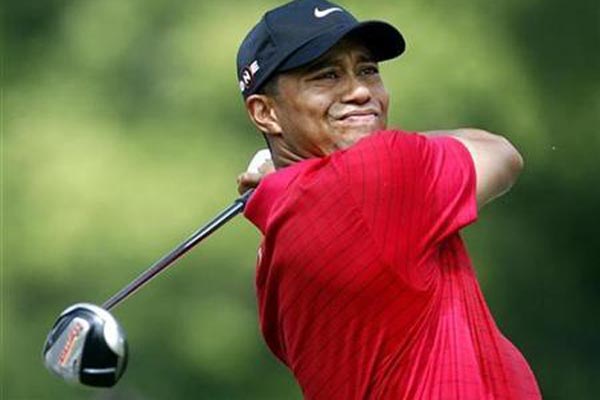 Pegol kenamaan Amerika Serikat Tiger Woods - Reuters