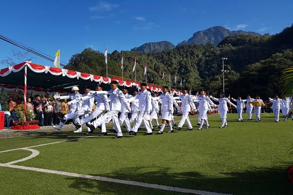 Upacara bendera peringatan Hari Ulang Tahun (HUT)  ke-73 Republik Indonesia di Kota Tambang, Tembagapura, Timika, Papua, yang diselenggarakan oleh PT Freeport Indonesia (PTFI), Jumat (17/8). - JIBI/Maria Yuliana Benyamin 