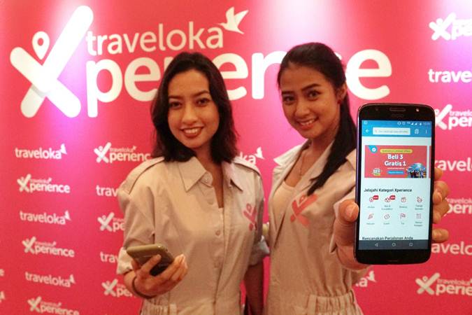 Model menunjukkan produk baru Traveloka di sela-sela konferensi pers, di Jakarta, Kamis (20/6/2019). - Bisnis/Himawan L Nugraha