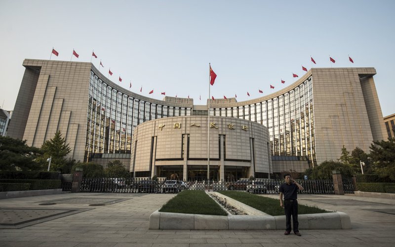 Kantor pusat People's Bank of China di Beijing -  Bloomber / Qilai Shen