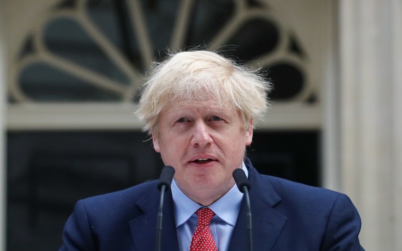 Perdana Menteri Inggris Boris Johnson memberikan pidato resmi pertamanya setelah sembuh dari Covid-19 -  Bloomberg / Simon Dawson 