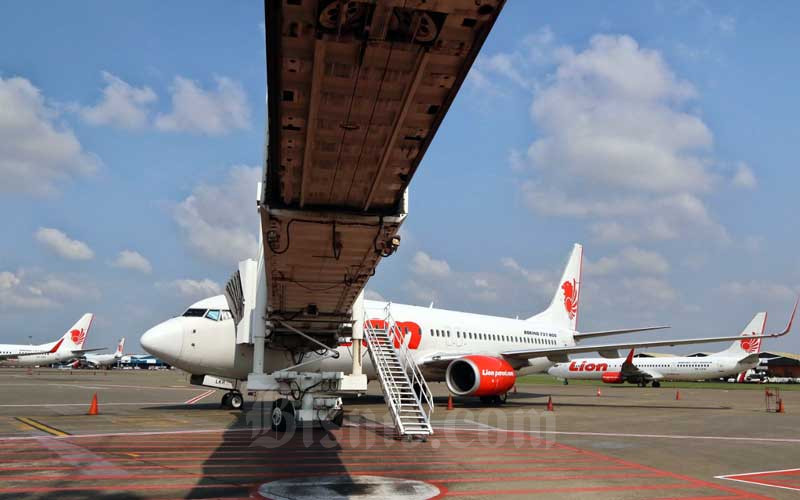 Pesawat Lion Air terparkir di Apron Bandara Soekarno-Hatta, Tangerang, Banten, Selasa (17/3/2020). Bisnis - Eusebio Chrysnamurti