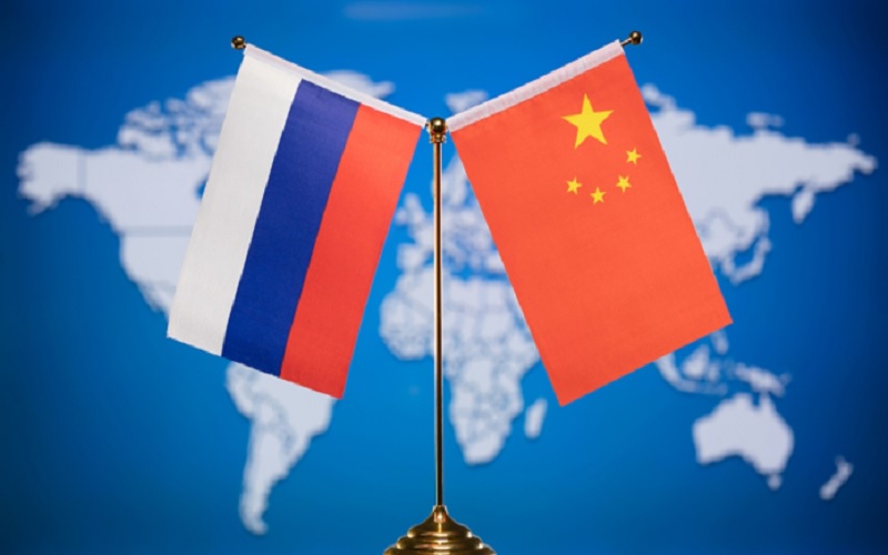Bendera Rusia dan China - Istimewa
