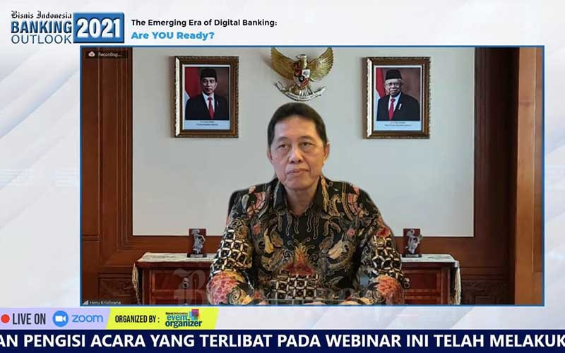 Kepala Eksekutif Pengawas PerbankanOJK Heru Kristiyana (dalam layar) memberikan pemaparan dalam Banking Outlook 2021 secara webinar di Jakarta, Selasa (7/9/2021). Bisnis - Himawan L Nugraha