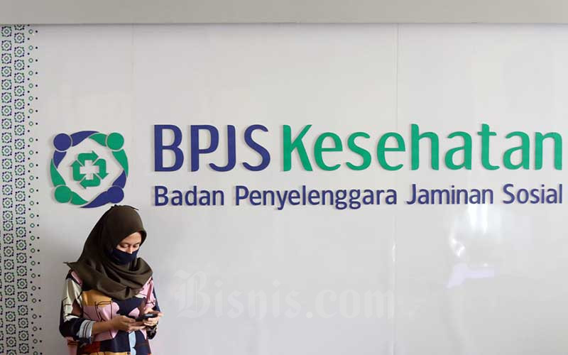 Karyawan beraktivitas di Kantor Badan Penyelenggara Jaminan Sosial (BPJS) Kesehatan, Jakarta, Rabu (13/5/2020). Pemerintah berencana untuk tidak membuat perbedaan pada pasien rawat inap BPJS Kesehatan - Eusebio Chrysnamurti