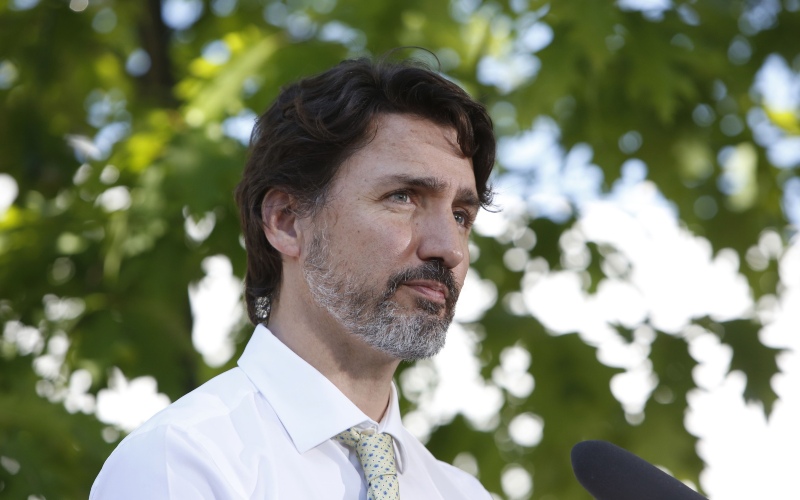 Perdana Menteri (PM) Kanada Justin Trudeau dalam sebuah konferensi pers di Chelsea, Quebec, Kanada, Jumat (19/6/2020). - Bloomberg/David Kawai