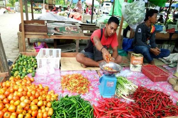 Menjelang Natal dan pergantian tahun, harga bahan pokok di pasar tradisional di Balikpapan mulai naik. - Bisnis.com/Fariz Fadhillah