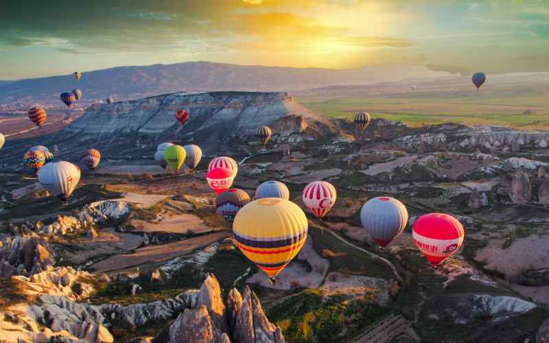 Wisata balon udara yang terkenal di Cappadocia, Turki - Unsplash/Mehmet Turgut Kirkgoz.