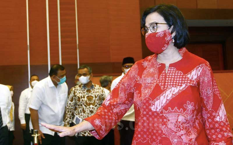 Menteri Keuangan Sri Mulyani Indrawati bersiap memberikan pemaparan dalam konferensi pers Realisasi APBN 2021 di Jakarta, Senin (3/1/2021). Bisnis - Himawan L Nugraha