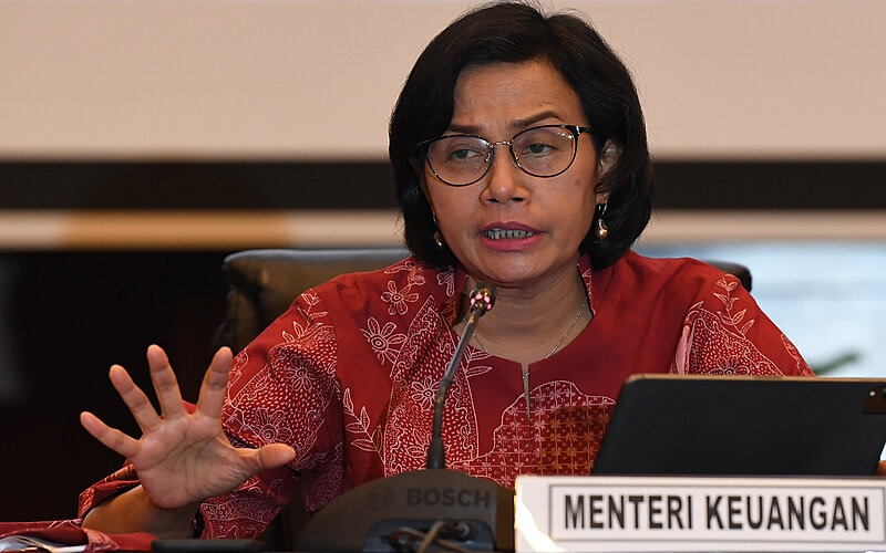 Menteri Keuangan Sri Mulyani menyampaikan keterangan pers tentang realisasi pelaksanaan APBN 2021 di kantor Kemenkeu, Jakarta, Senin (3/1/2022). - Antara/Sigid Kurniawan.