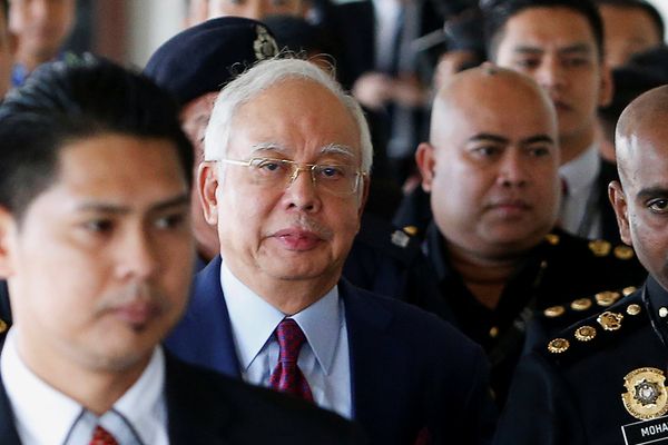 Mantan PM Malaysia Najib Razak tiba di pengadilan di Kuala Lumpur, Malaysia, Rabu (4/7). - Reuters/Lai Seng Sin