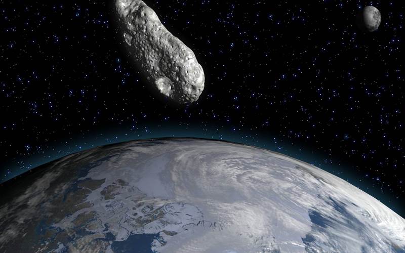 Ilustrasi asteroid menuju Bumi - Bisnis