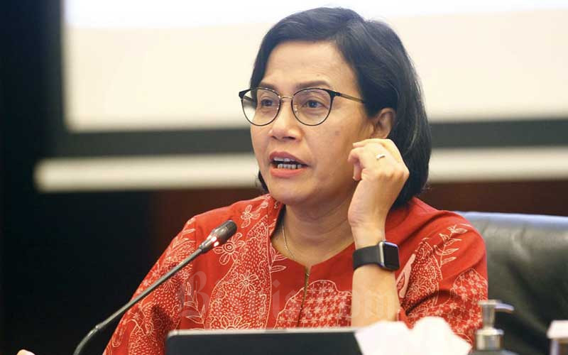 Menteri Keuangan Sri Mulyani Indrawati memberikan pemaparan dalam konferensi pers Realisasi APBN 2021 di Jakarta, Senin (3/1/2021).  - Bisnis/Himawan L Nugraha