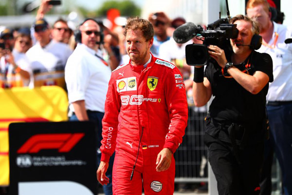 Pembalap Ferrari Sebastian Vettel seusai GP Kanada 2019. - Antara/AFP
