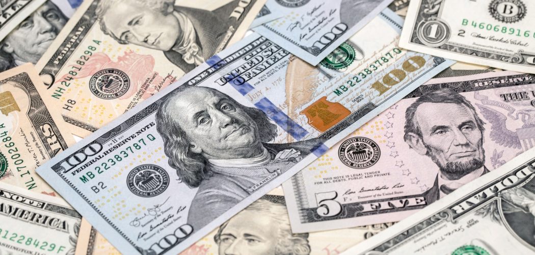Uang kertas dolar AS. - Bloomberg/Paul Yeung