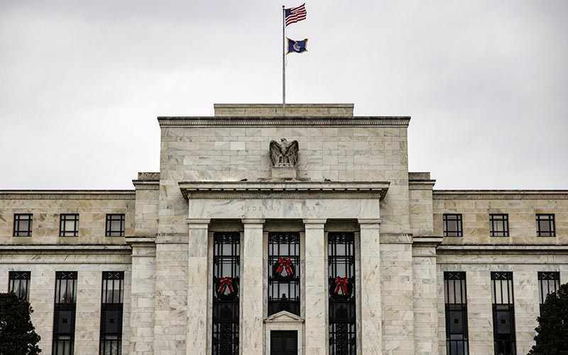 Gedung bank central Amerika Serikat atau The Federal Reserve di Washington, Amerika Serikat, Minggu (19/12/2021). Bloomberg - Samuel Corum