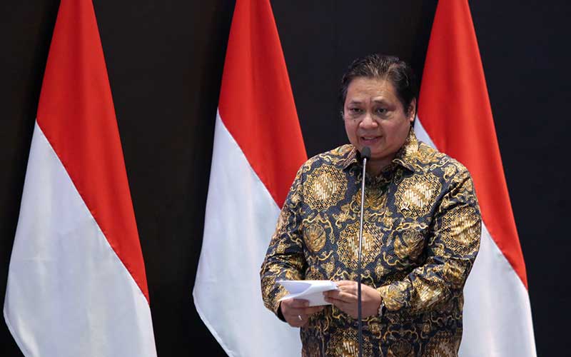 Menko Perekonomian Airlangga Hartarto memberikan sambutan saat pembukaan pembukaan perdagangan Bursa di BEI, Jakarta, Senin (3/1/2021).  - Bisnis