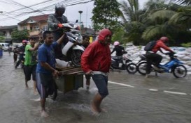 Kadin DKI Rame-Rame Bantu Korban Banjir