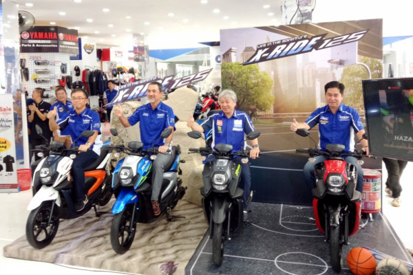 Jajaran manajemen PT Yamaha Indonesia Motor Manufacturing (YIMM) memperkenalkan skutik All New X-Ride 125 di Kemayoran, Jakarta, Sabtu (30/6 - 18). /ANTARA 