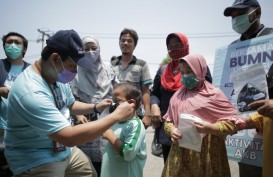 Tebar Masker, Pupuk Indonesia Ajak Masyarakat Disiplin Protokol Kesehatan