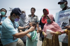 Tebar Masker, Pupuk Indonesia Ajak Masyarakat Disiplin…
