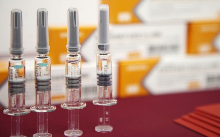 Botol vaksin CoronaVac SARS-CoV-2 Sinovac ditampilkan di acara media di Beijing, China, pada 24 September.  - Bloomberg\\r\\n