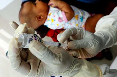 Foto-Foto Tenaga Kesehatan Jemput Bola Untuk Lakukan Imunisasi Balita di Aceh