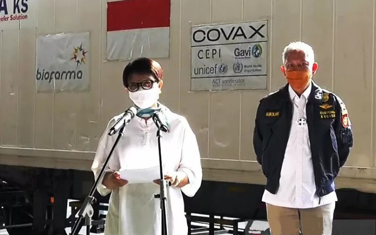 Menteri Luar Negeri Retno Marsudi memberikan keterangan pers secara virtual terkait ketibaan batch ketiga vaksin AstraZeneca dari Covax Facility, Kamis (10/6/2021).  - ANTARA/Rangga Pandu Asmara Jingga