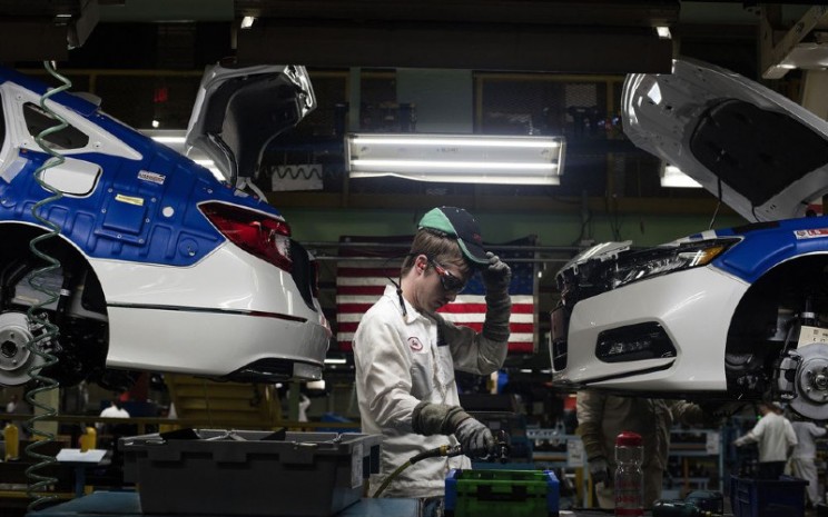 Seorang pekerja di Pabrik Honda America Manufacturing Inc. di Marysville, Ohio.  - Bloomberg 