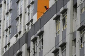 Dinding Bangunan RSDC Wisma Atlet Kemayoran Dilapisi…