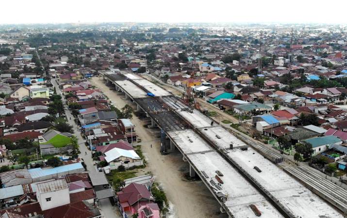 Foto udara pembangunan jalan tol ruas Medan-Binjai yang merupakan bagian dari Tol Trans Sumatra di Deli Serdang, Sumatra Utara, Rabu (6/3/2019). - Bisnis/Abdullah Azzam 