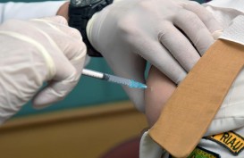 OJK, Polda, Kadin dan Iwapi Riau Salurkan 1.911 Dosis Vaksin Covid-19
